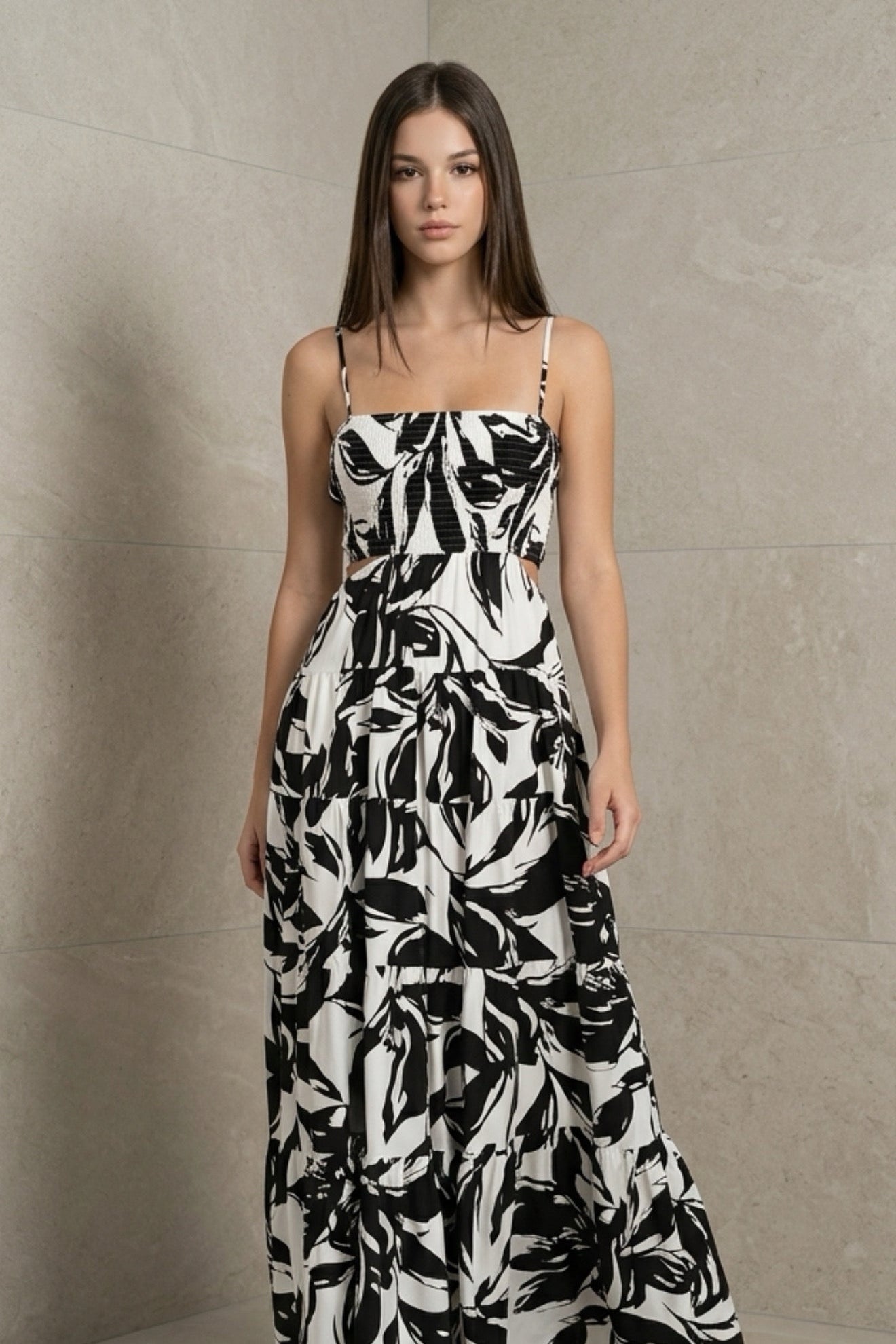 Black and white floral printed woven cut out maxi dress with adjustable straps and tiered skirt